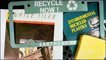 Recycled plastic license plate holders and other recycled-content products