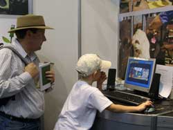 Parents and children exploring Ollie programs at Sydney Royal Easter Show