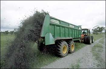 Tractor trailer spreading biosolids