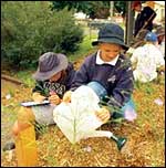 Students watering plants