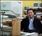 Australia Post employee with computers