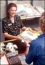Postal employee with Express Post satchel