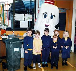 Milk bottle mascot in classroom